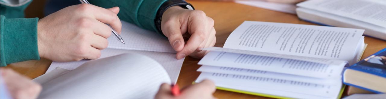 Student using a textbook